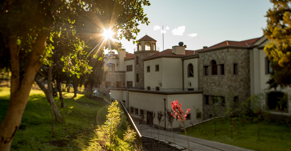 Villa Beluno at sunset: this exclusive Italian-style villa commands the lake from atop the San Pedro Peninsula.